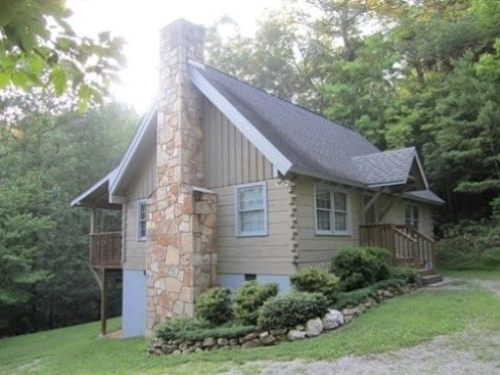 Cable TV, Hot tub, trash pick up, Two queen-size beds includes linens, bathroom shower/tub & two sinks, hairdryer, towels & wash clothes, kitchen includes range, refrigerator, microwave, toaster, coffeemaker | Highland Glade Cabin Rentals | Gatlinburg, TN