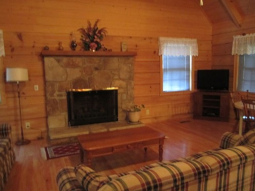 Cable TV, Hot tub, trash pick up, Two queen-size beds includes linens, bathroom shower/tub & two sinks, hairdryer, towels & wash clothes, kitchen includes range, refrigerator, microwave, toaster, coffeemaker | Highland Glade Cabin Rentals | Gatlinburg, TN